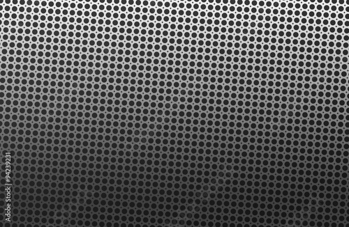 Metal background abstract with back holes.