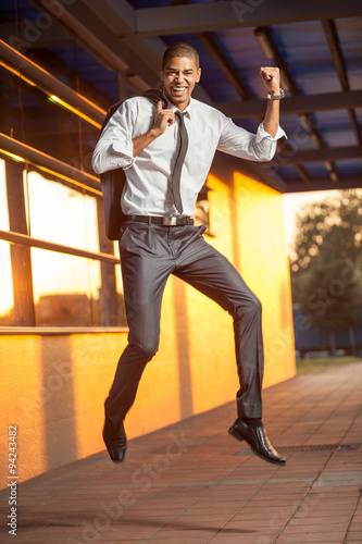 businessman jumping, happy about the successful conclusion of a