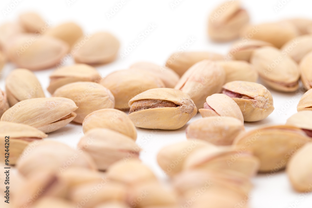 pistachios on a white background. close pistachios on a white background. close