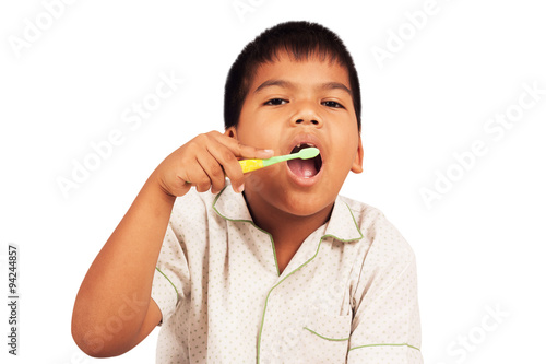 Cute Little Boy Brushing Teeth