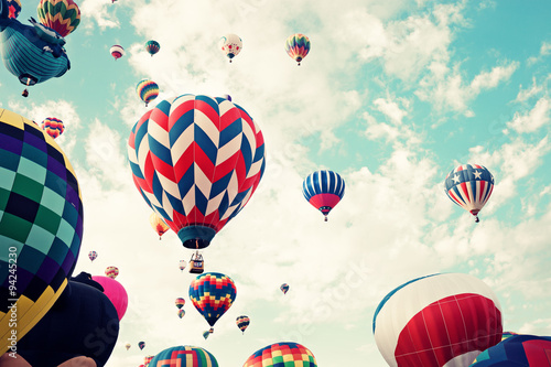Vintage hot air balloons in flight