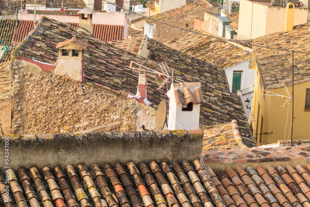 Full frame take of the tiled rooftops of a Mediterranean old town