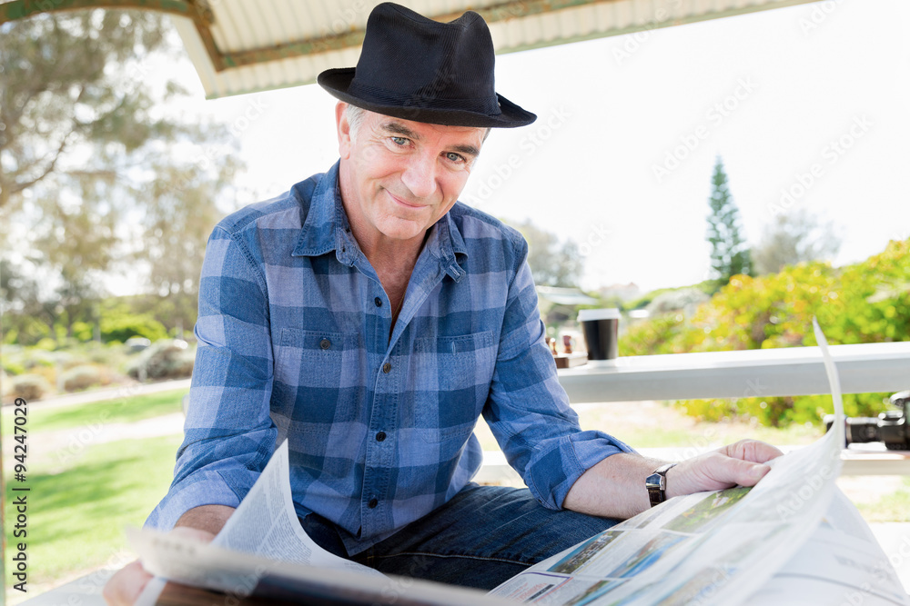 Fototapeta premium Enjoying reading of newspaper