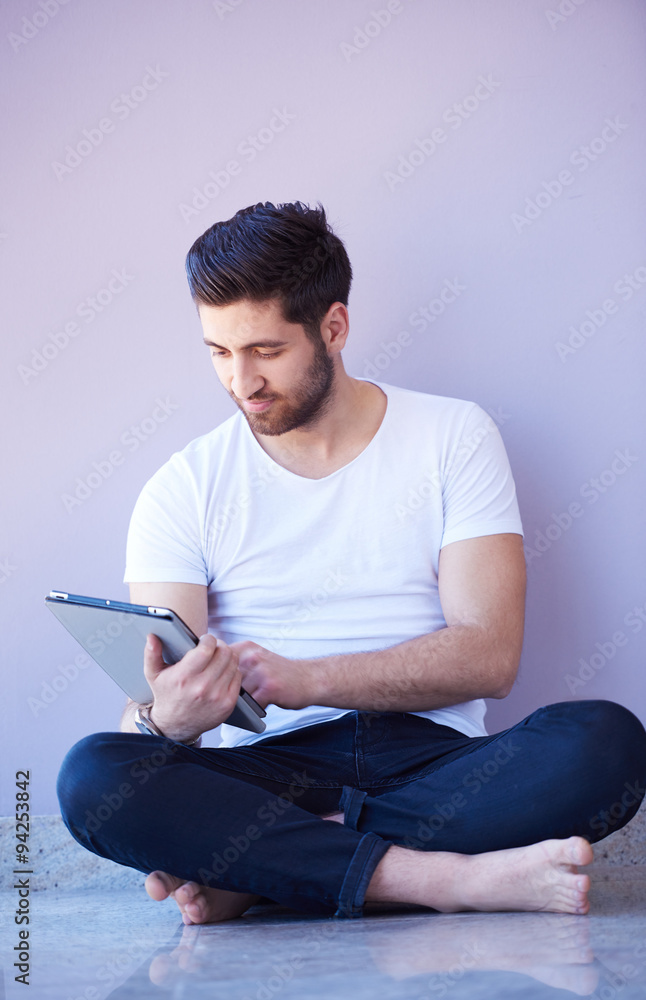 student working on tablet student working on tablet