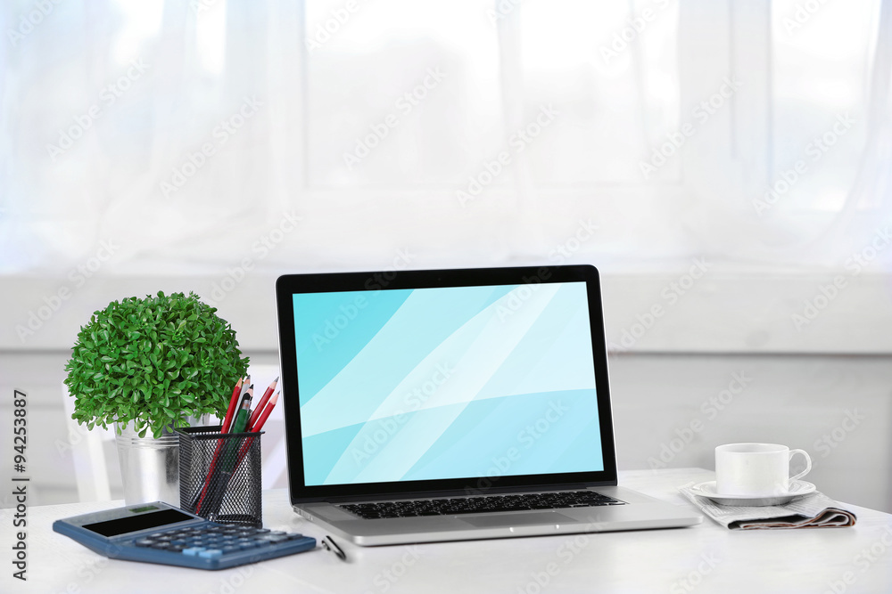Fototapeta premium Modern workplace with laptop, close up