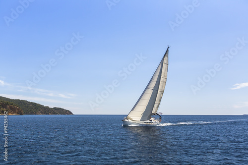 Sailing ship yachts with white sails in the Mediterranean Sea. © De Visu