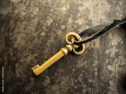 antique golden door key © geenamp