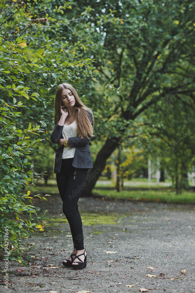 Girl standing and waiting outside 3704. Girl standing and waiting outside 3704.