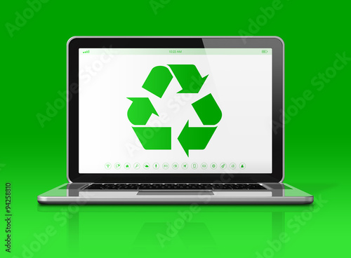 Fototapeta Naklejka Na Ścianę i Meble -  Laptop with a recycle symbol on screen. environmental conservati