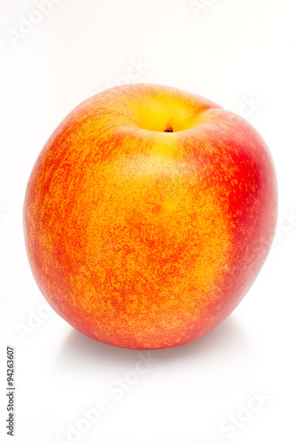Two-colored orange and red peach isolated on white background. Clipping path included