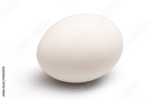 Single white chicken egg isolated on white background. Clipping path included