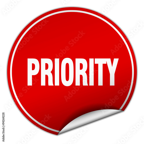 priority round red sticker isolated on white