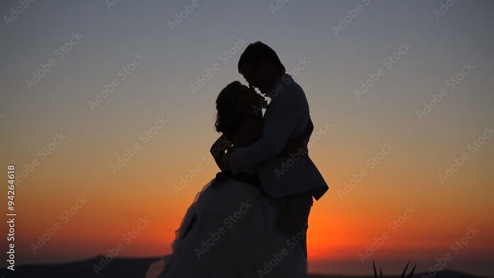 couple dancing on a background of a sunset couple dancing on a background of a sunset
