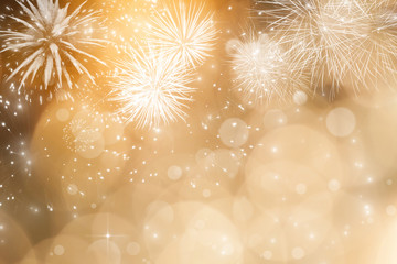 Abstract holiday background with fireworks and sparkling lights