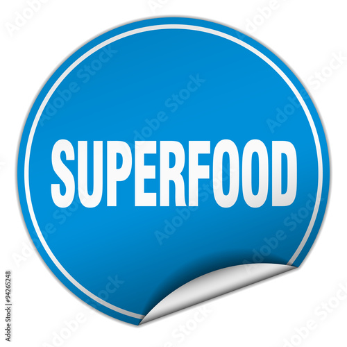 superfood round blue sticker isolated on white