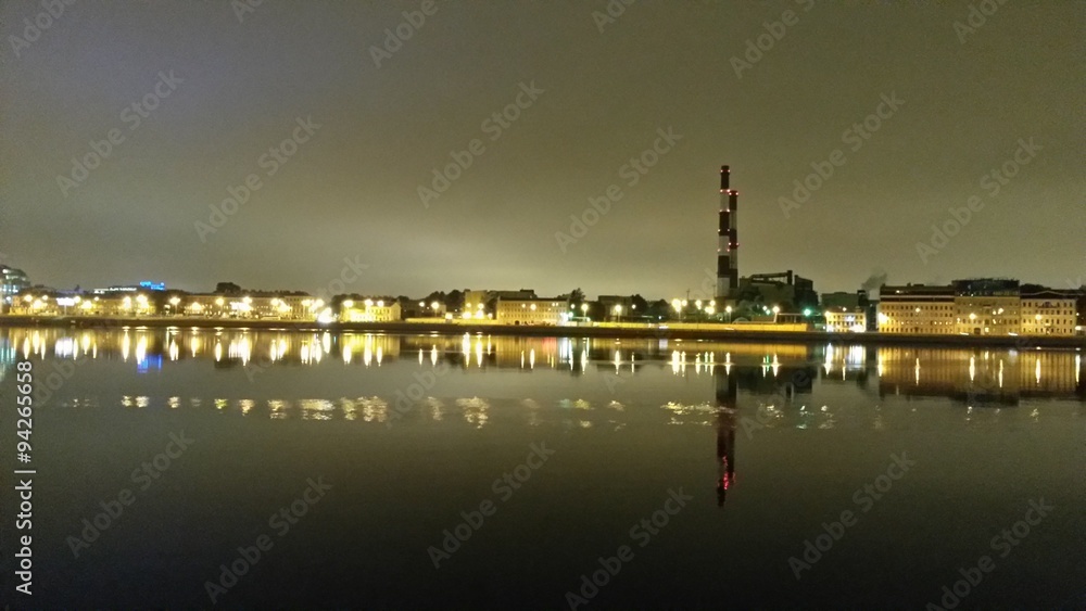An urban view of the river embankment by night