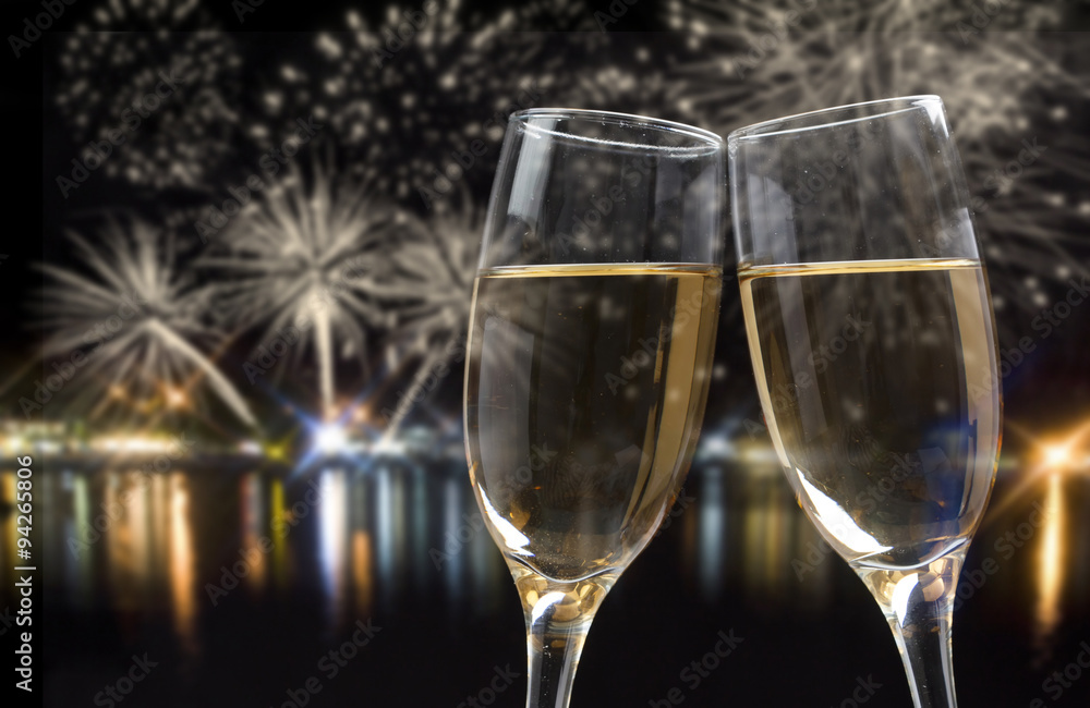 Celebrating New Year with champagne and fireworks Celebrating New Year with champagne and fireworks