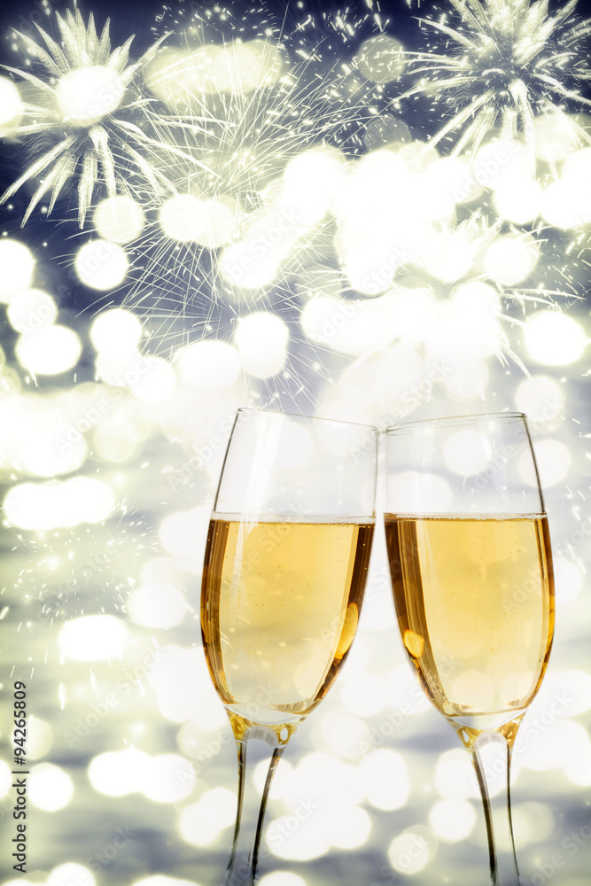 Celebrating New Year with champagne and fireworks Celebrating New Year with champagne and fireworks