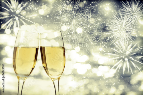 Celebrating New Year with champagne and fireworks