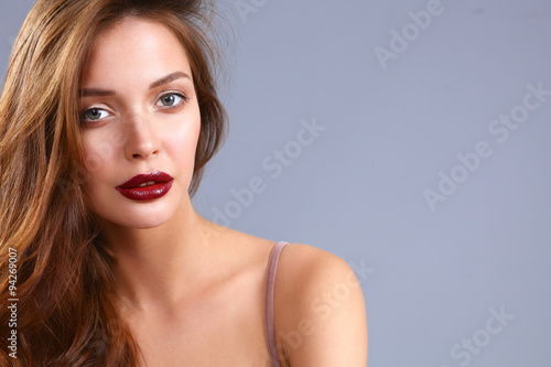 Portrait of beautiful woman , isolated on gray background