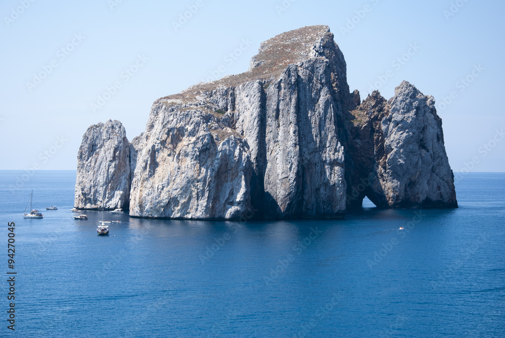 Pan di Zucchero rocks in the sea, in Masua (Nedida), Sardinia. 
