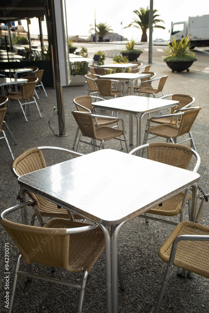 Metal rattan tables and chairs outdoor of restaurant. Metal rattan tables and chairs outdoor of restaurant.