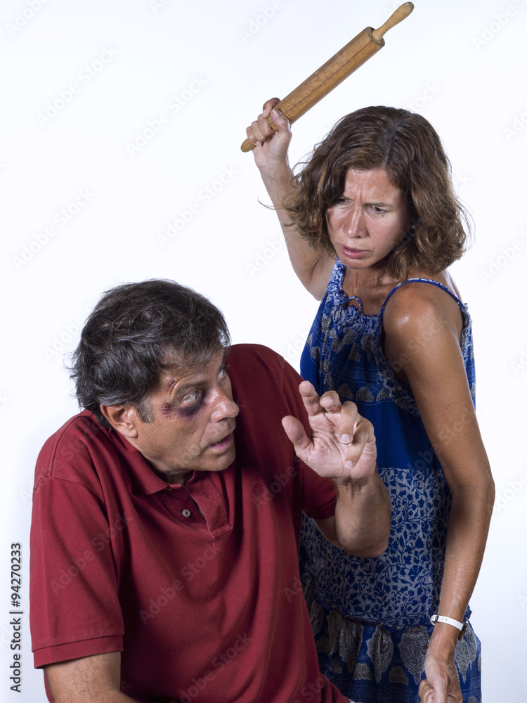 bue pålægge rester woman with a rolling pin, beating her husband Stock Photo | Adobe Stock