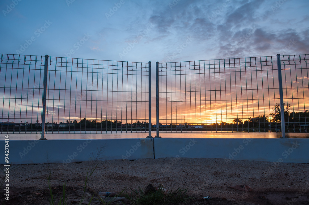 Sunrise at the lakeside fence and eliminate freedom. Sunrise at the lakeside fence and eliminate freedom.