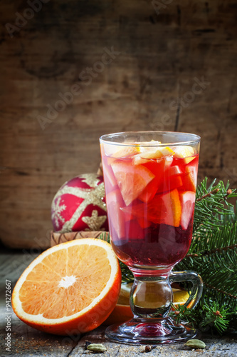 Christmas composition with mulled wine with orange, fir branches