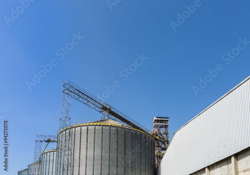 Beautiful blue sky and big tanks factory © watchr