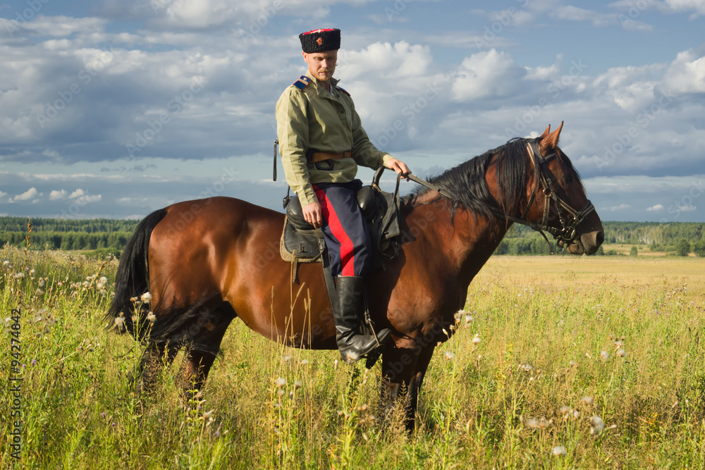 Russian Cossack inspecting the border on horseback