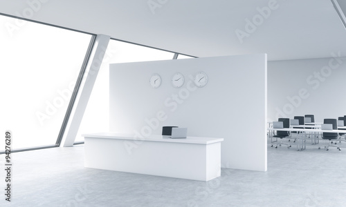 Reception area with clocks and workplaces in a bright modern open space loft office. White tables and black chairs. White copy space in the panoramic windows. 3D rendering.
