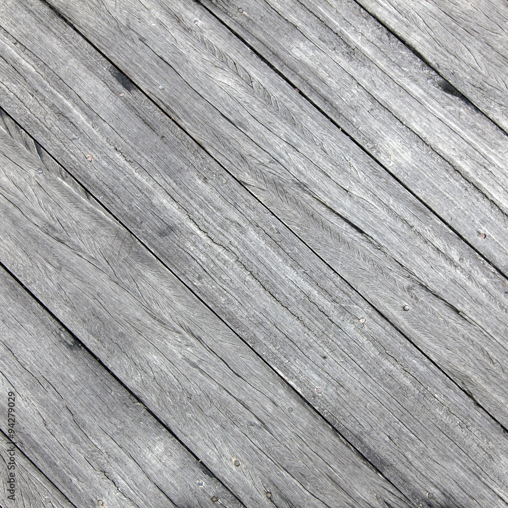 square picture of old rough gray wooden planks diagonally placed square picture of old rough gray wooden planks diagonally placed