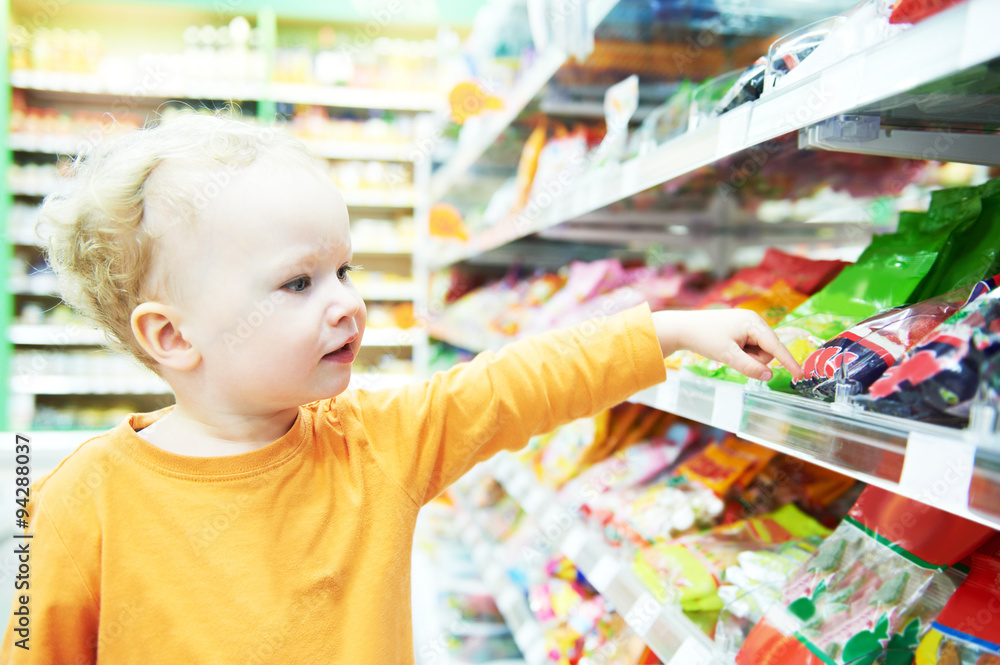 child making food shopping at grocery store