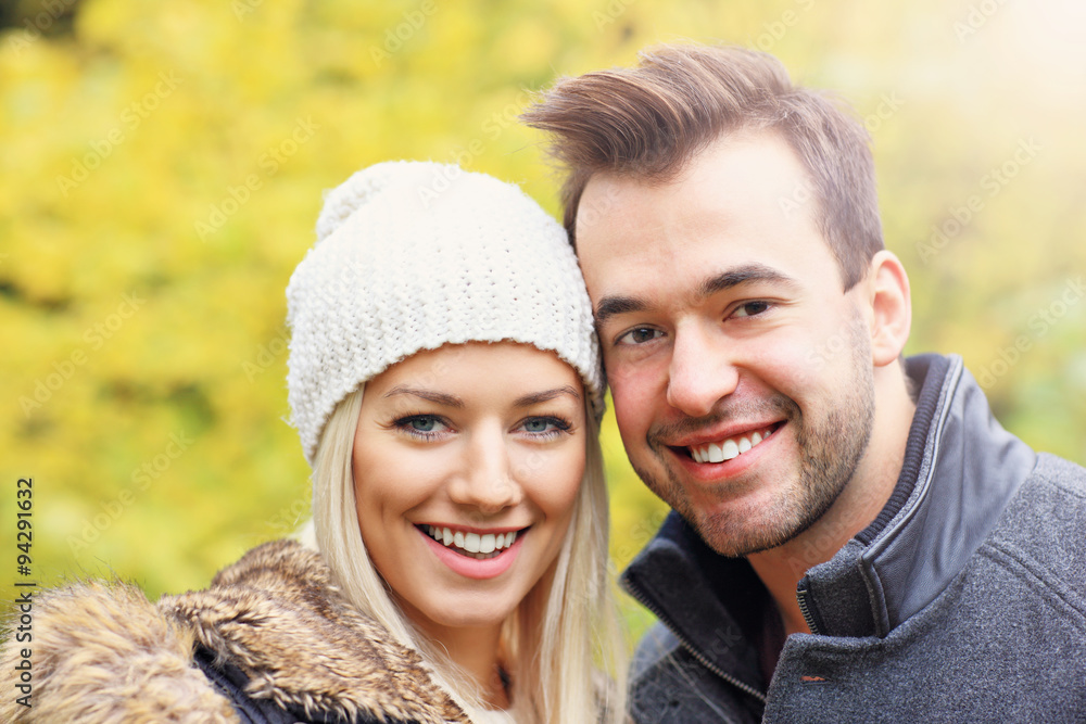 Young romantic couple in the park in autumn Young romantic couple in the park in autumn