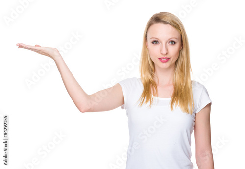 Young Woman with hand showing blank sign