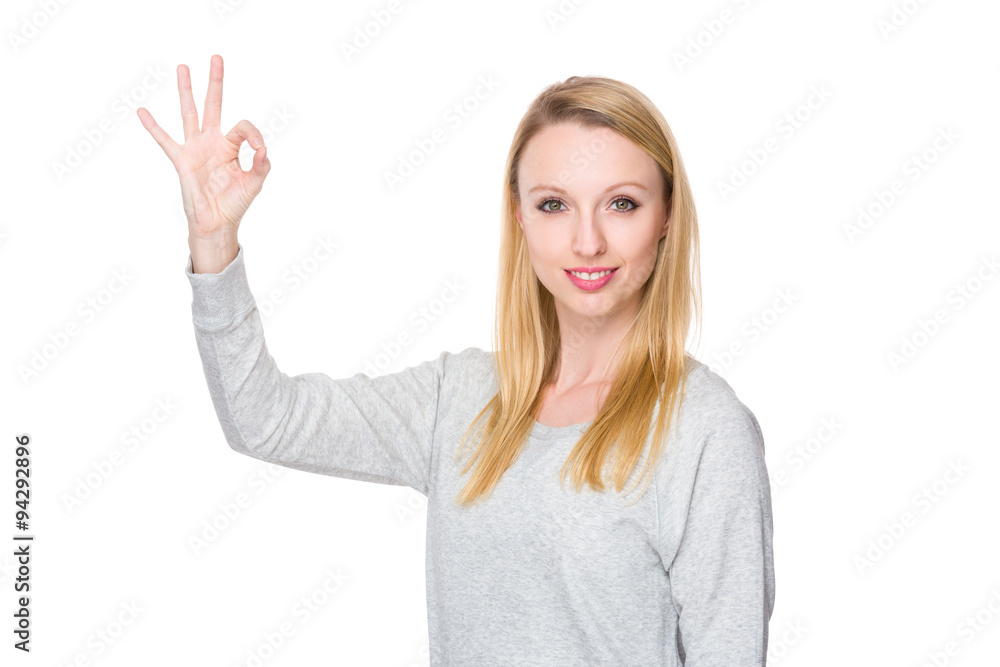 Caucasian young woman with ok sign geature Caucasian young woman with ok sign geature