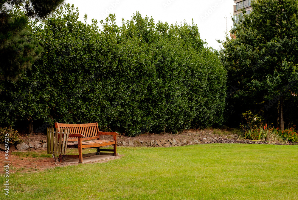 Wooden armchair in the garden Wooden armchair in the garden