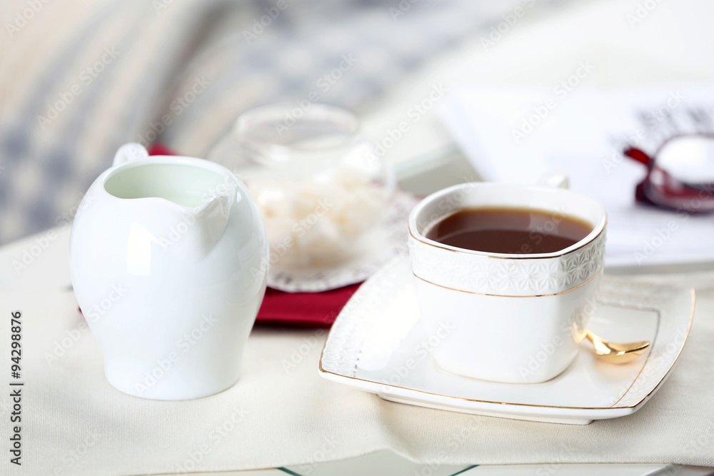 Cup of tea on table in living room Cup of tea on table in living room