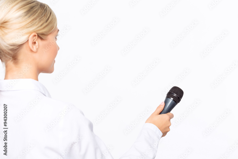 Agreeable TV announcer being involved in work Agreeable TV announcer being involved in work