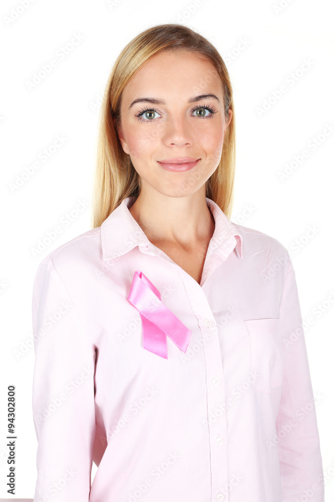 Woman using pink ribbon on her chest isolated on white Woman using pink ribbon on her chest isolated on white