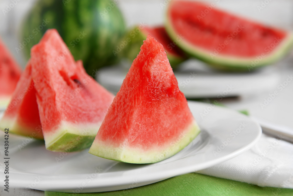 Sliced watermelon on plate closeup