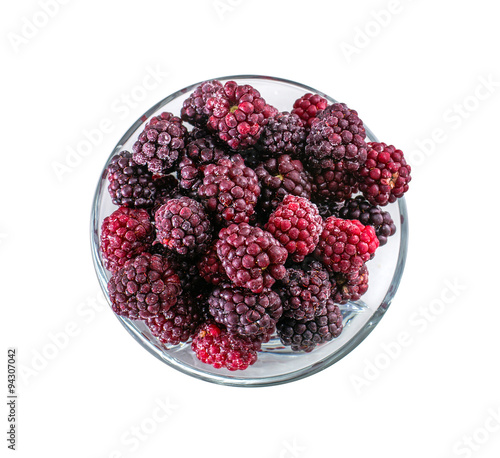 Frozen domestic red blackberries - isolated on white background