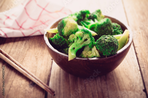 Stir-Fried Broccoli on old wood table, Vegetarian food
