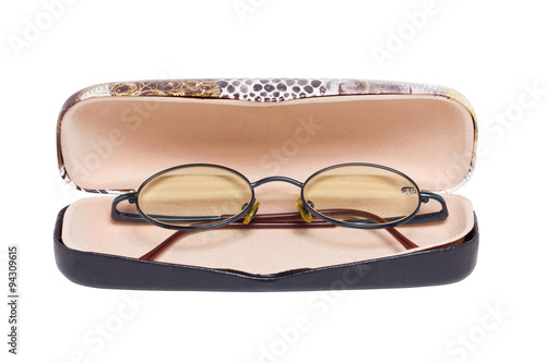 Eyeglass with container isolated on white.