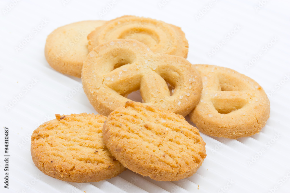 Group of butter cookies isolated on white.