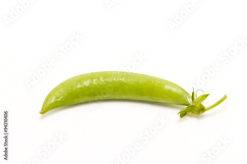Green peas isolated on white.