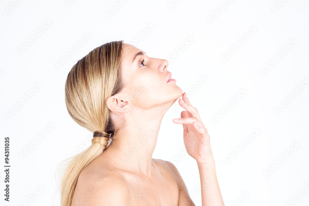 Profile of a beautiful young woman with outstretched neck Profile of a beautiful young woman with outstretched neck