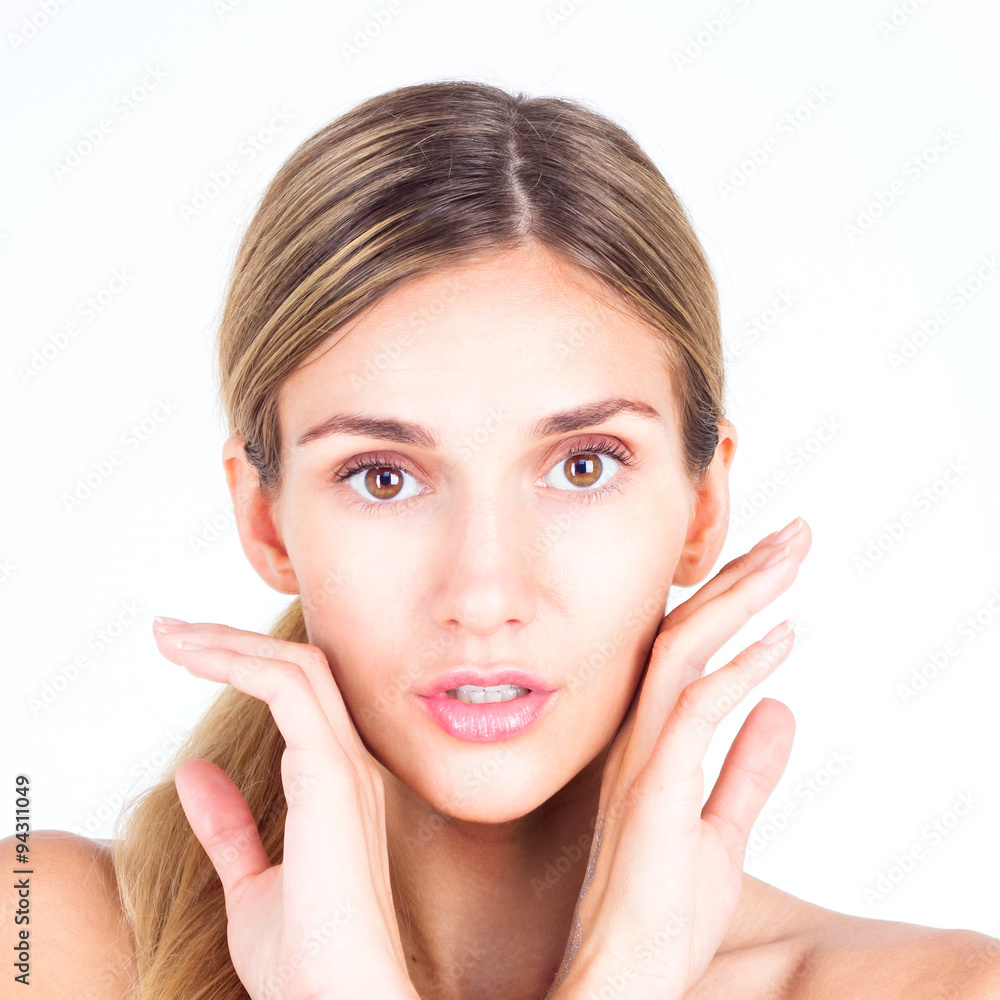 Spa & Beauty. Beautiful and clean face of woman. Beautiful woman touching her face with both hands Spa & Beauty. Beautiful and clean face of woman. Beautiful woman touching her face with both hands