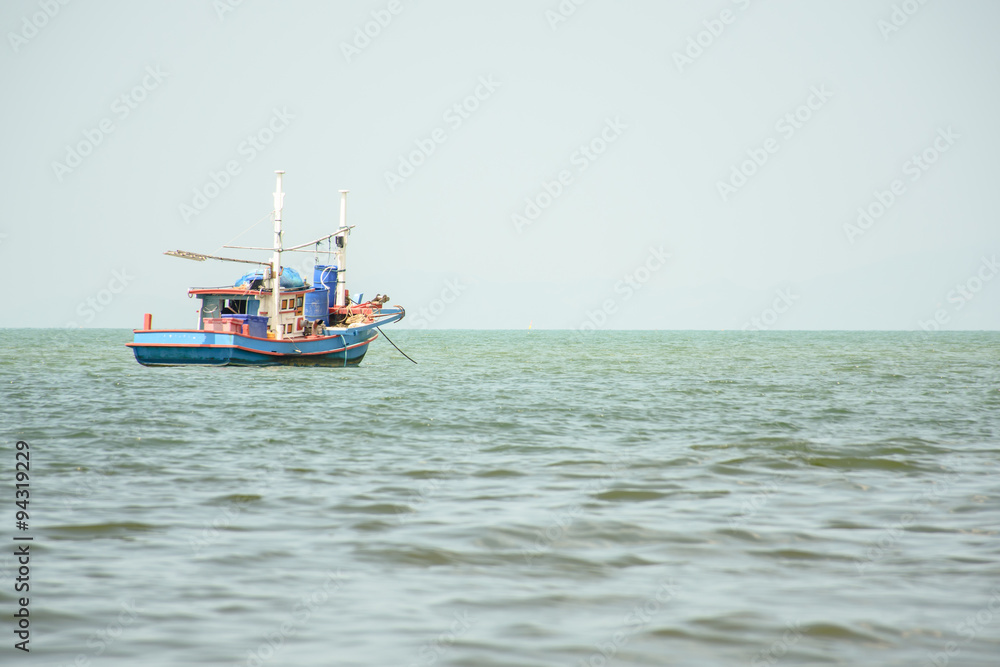 Fishing boat in sea, fishing for squid.